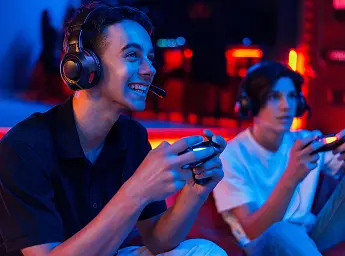 Parent and child gaming on the sofa