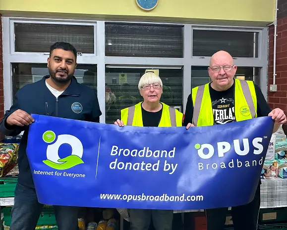 Two children enjoying a tablet connected with Opus Broadband